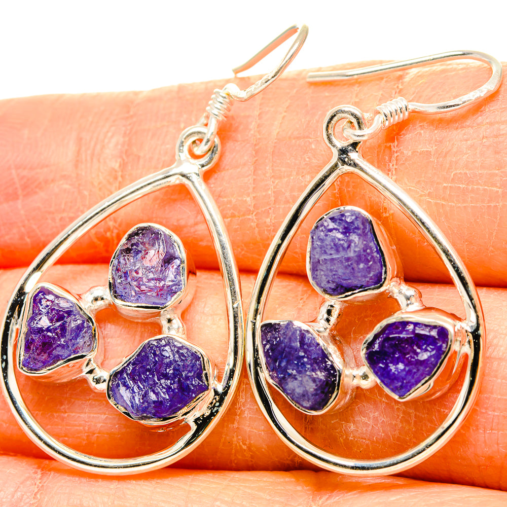 Sterling silver teardrop earrings with rough purple tanzanite stones and cluster, hook