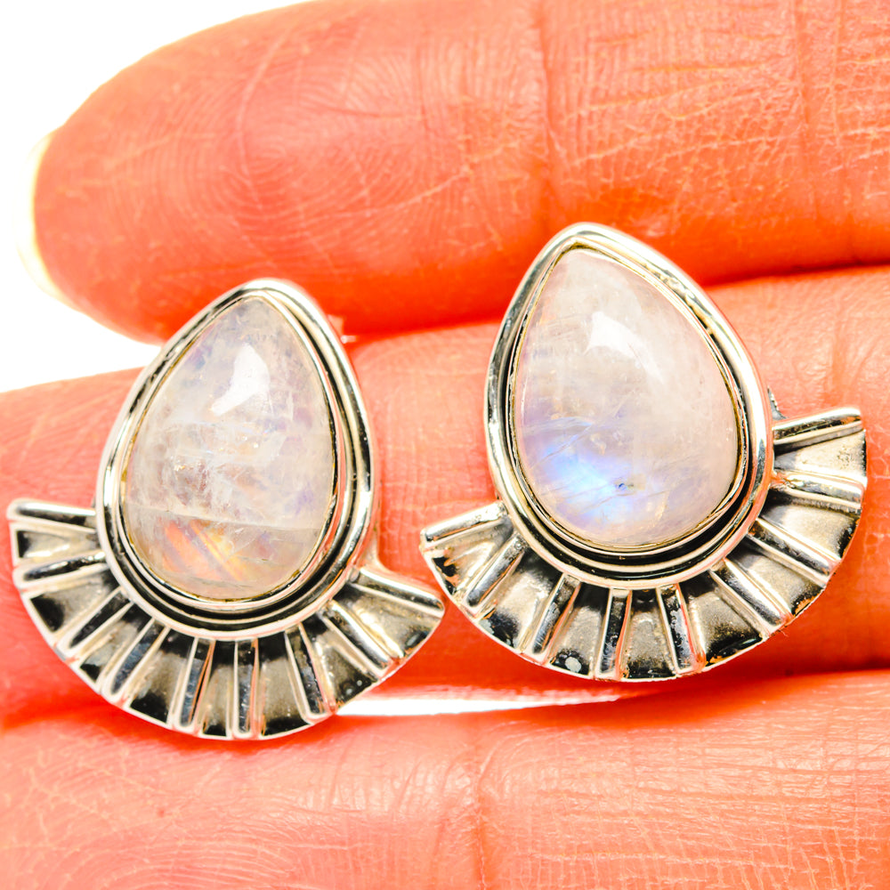 Sterling silver teardrop moonstone earrings with radiant fan detail and rainbow sheen