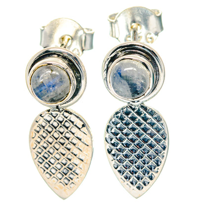 Sterling silver moonstone stud earrings with round stones and textured teardrop dangles