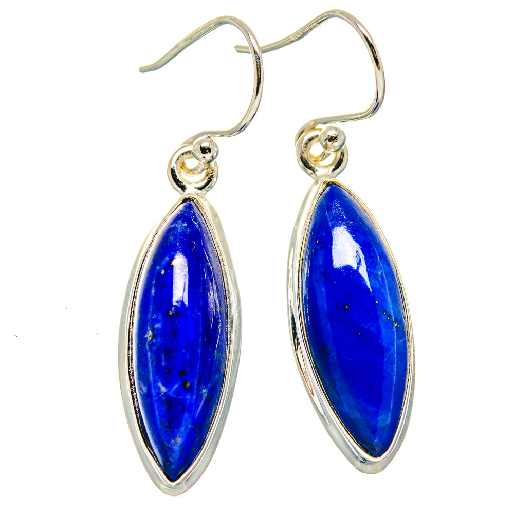 Sterling silver lapis lazuli drop earrings with oval blue stones and curved hooks.