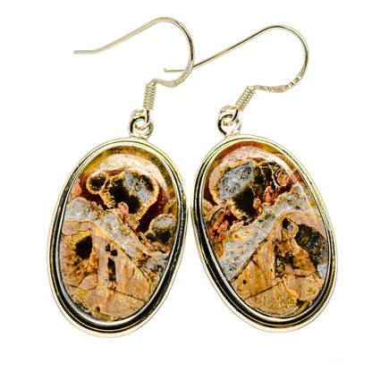 Sterling silver oval poppy jasper earrings with layered bezel and fishhook closures.