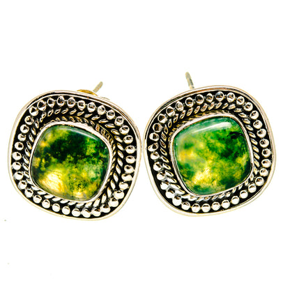 Silver stud earrings with green moss agate cabochons and beaded border around the bezel