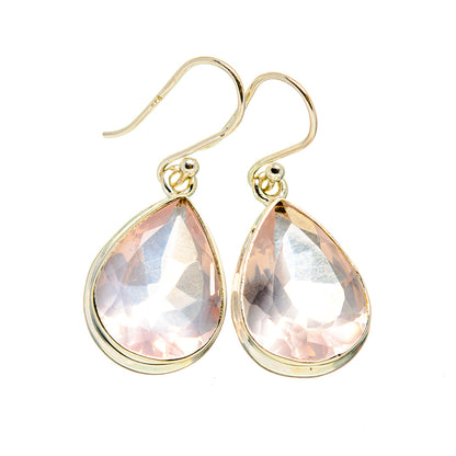 Teardrop rose quartz drop earrings in sterling silver, hook backs with pink faceted stones
