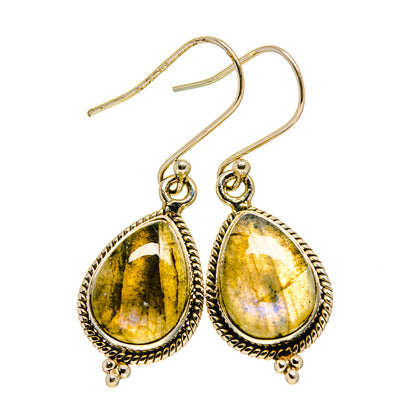 Teardrop labradorite drop earrings, gold-tone bezel and loop hooks.