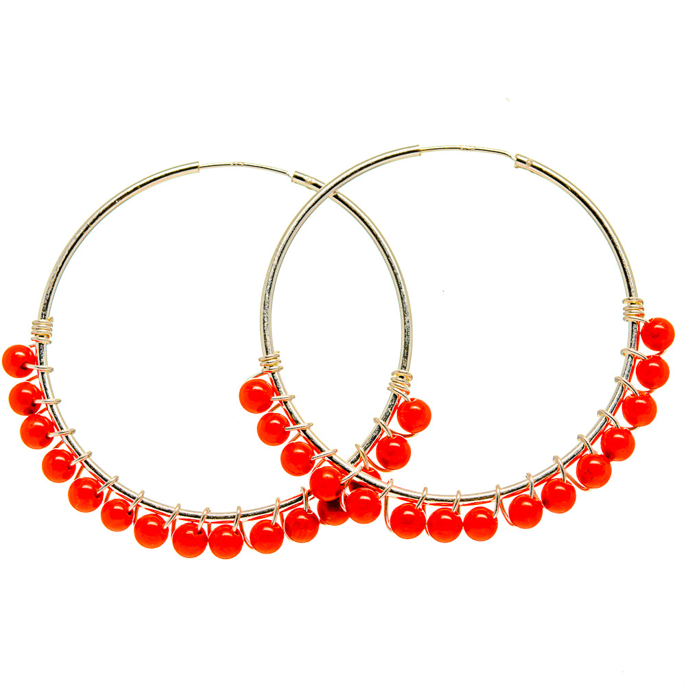 Red beaded hoop earrings in 925 sterling silver, with red bead fringe along the hoop