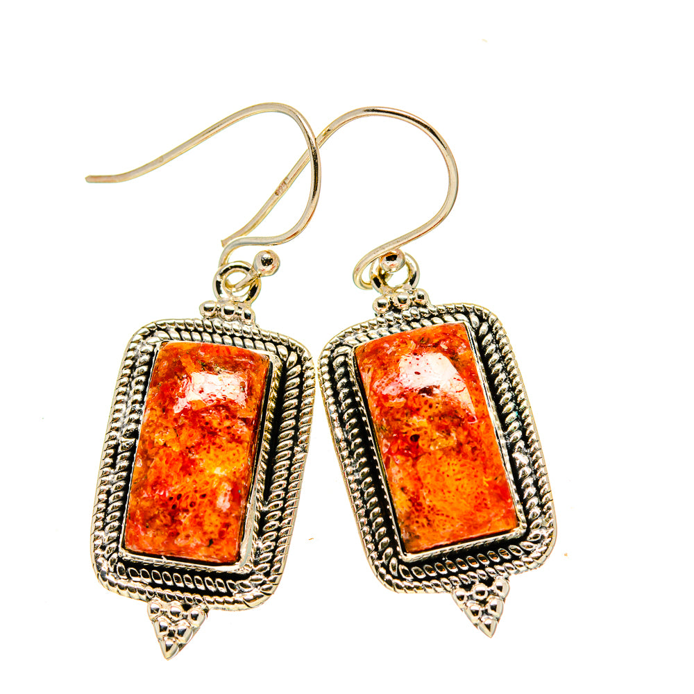 Rectangular coral drop earrings with ornate silver frames and orange stone accents