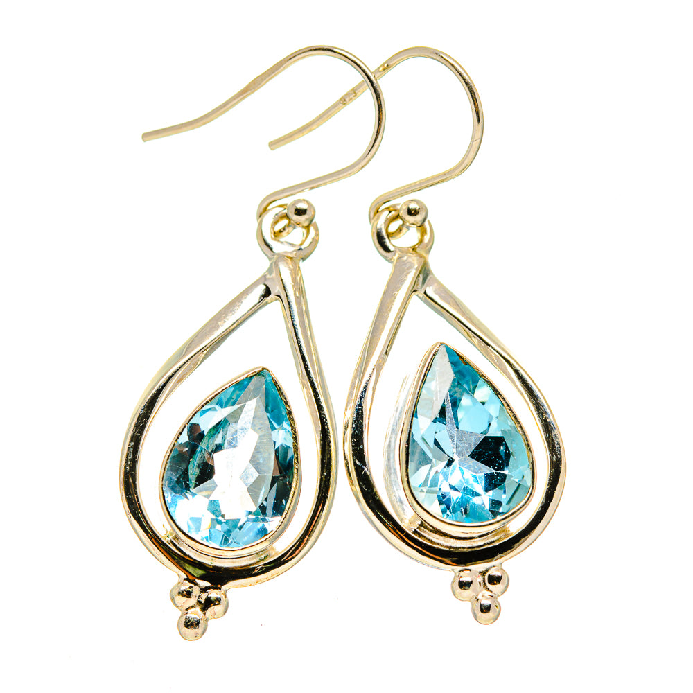Blue topaz drop earrings in gold-tone teardrop settings, 925 sterling silver hooks