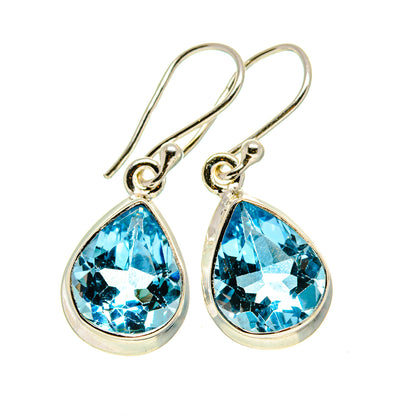 Sterling silver teardrop earrings with blue topaz gemstones, lever hooks