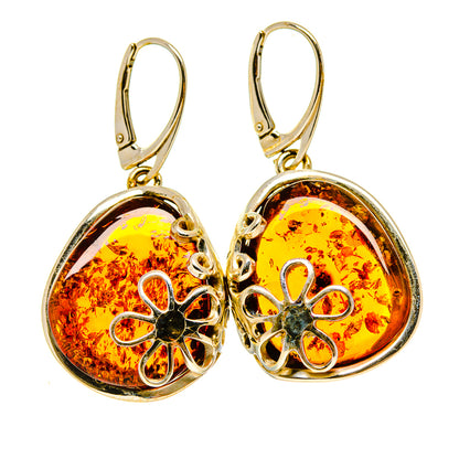 Pair of amber drop earrings in 925 sterling silver with floral filigree settings