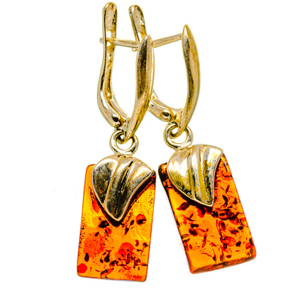 Gold-tone hoop earrings with rectangular Baltic Amber dangles