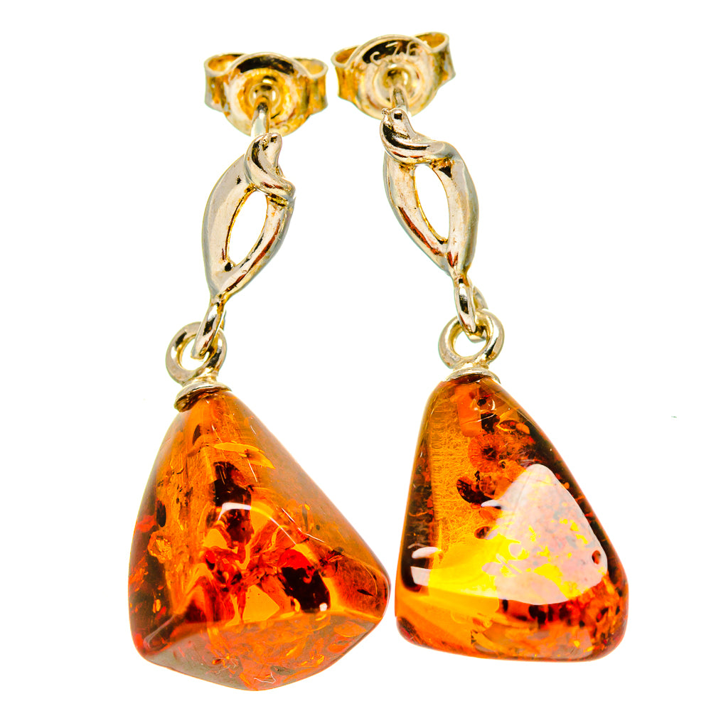 Amber teardrop earrings with gold-tone chain links and hook backs