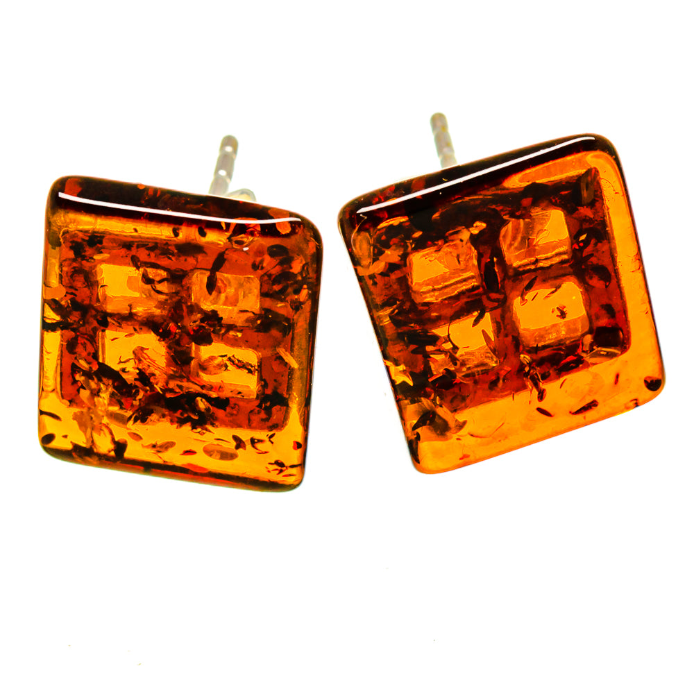 Square amber stud earrings with 925 sterling silver posts, warm orange with dark inclusions