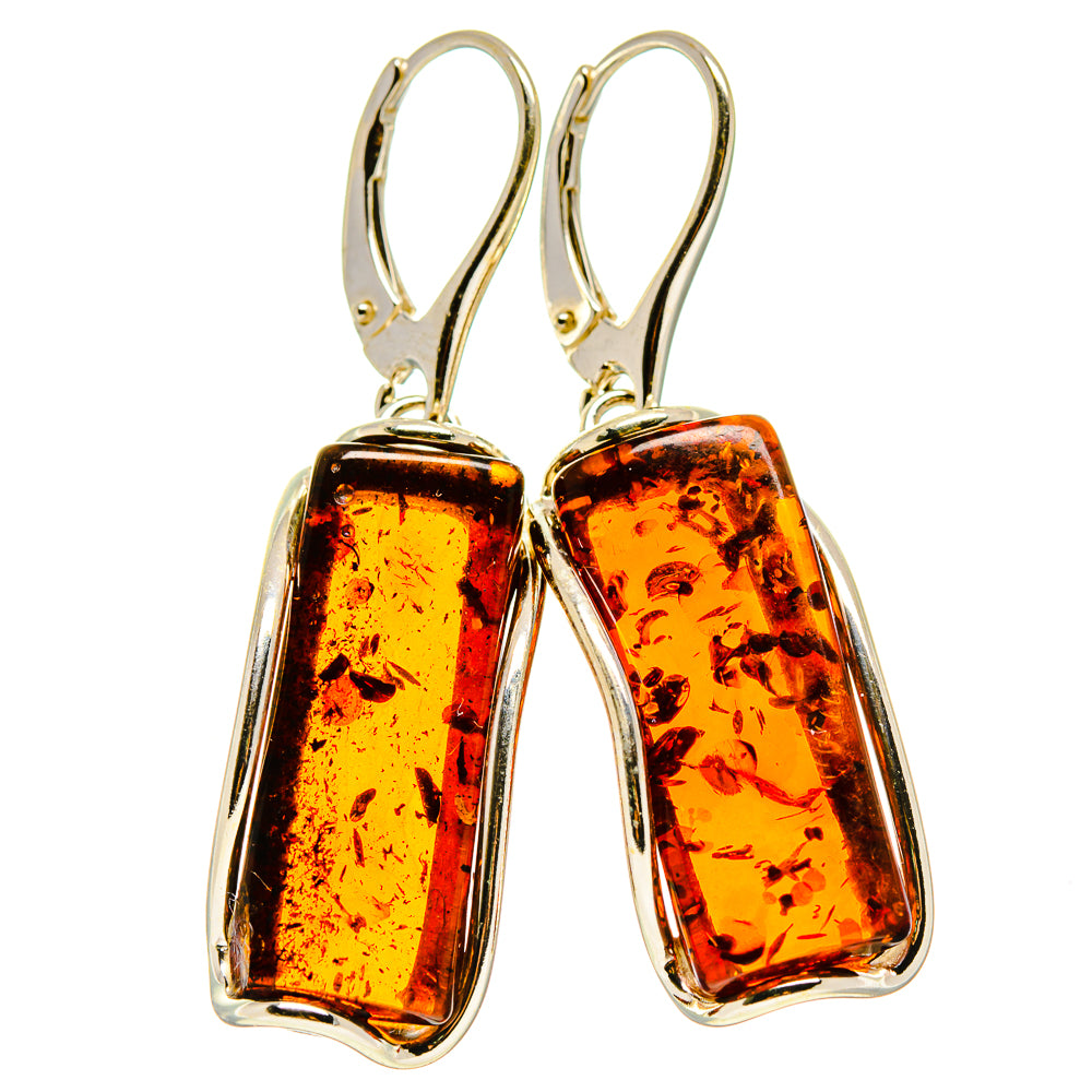 Amber and sterling silver drop earrings, rectangular amber stones in gold-tone frames