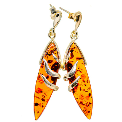 925 sterling silver Baltic amber drop earrings, orange teardrop stones with silver prongs