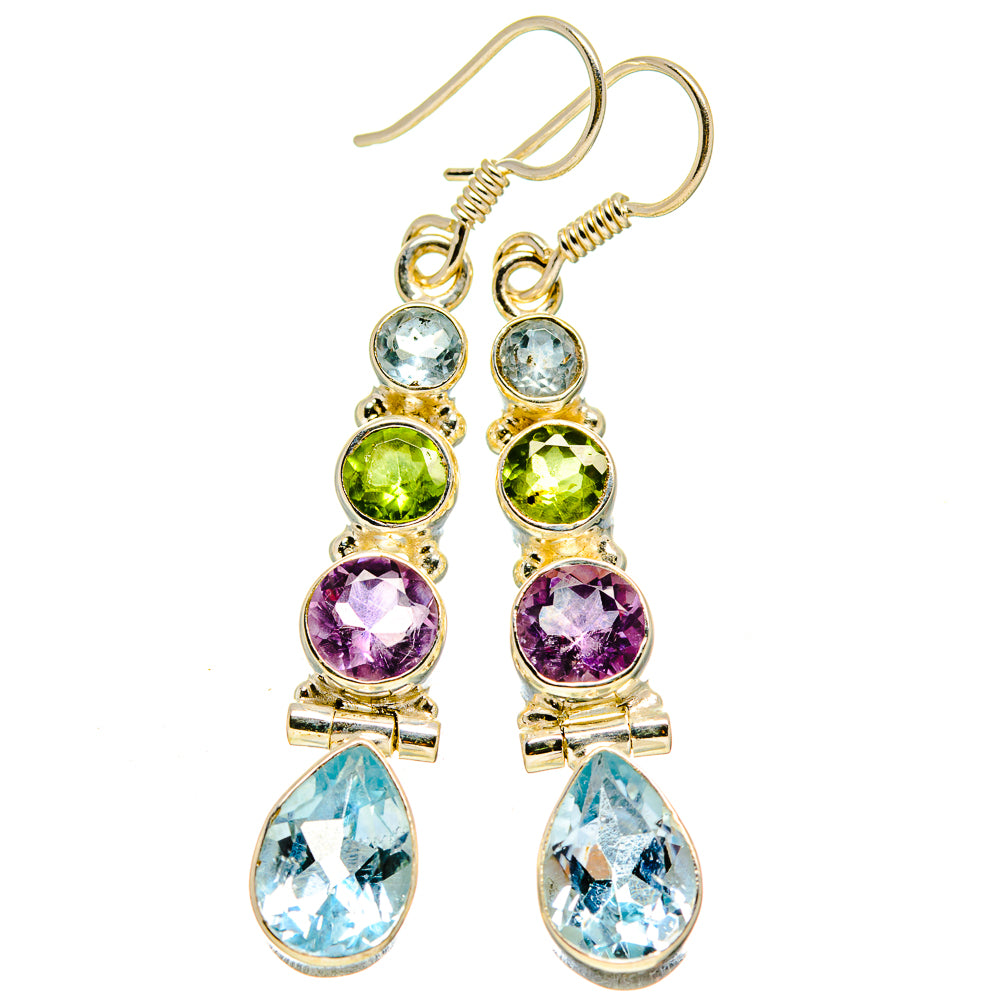 Gold-tone multicolor gemstone drop earrings with blue teardrops, purple rounds, and green accents