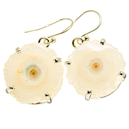 White solar quartz slice earrings with sterling silver prong hooks