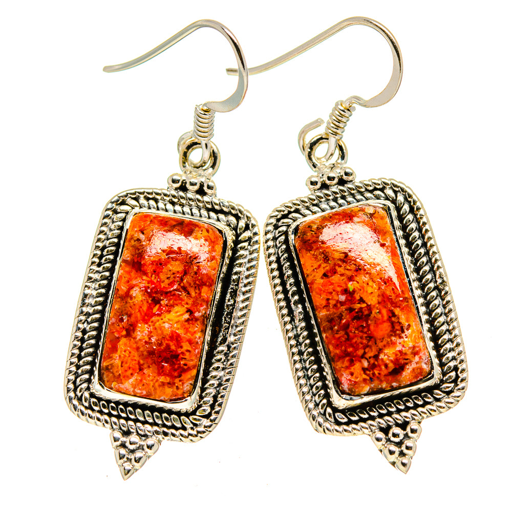 Sterling silver coral-style drop earrings with rectangular orange stone, textured frame