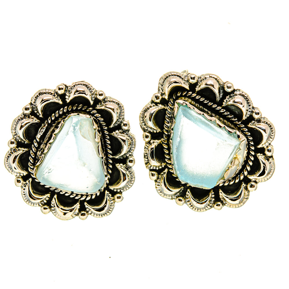 Pair of aquamarine heart stud earrings with decorative 925 sterling silver frames