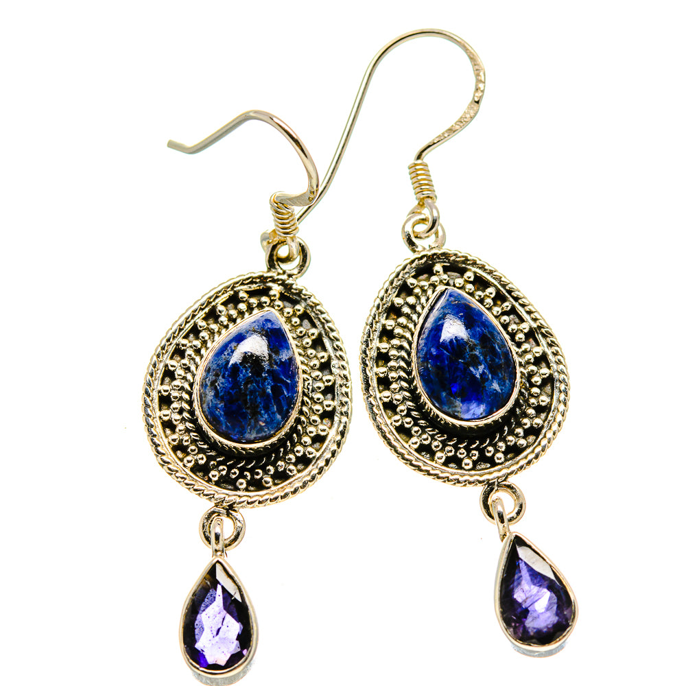 Round blue stone dangle earrings with ornate silver-tone frames and teardrop drops