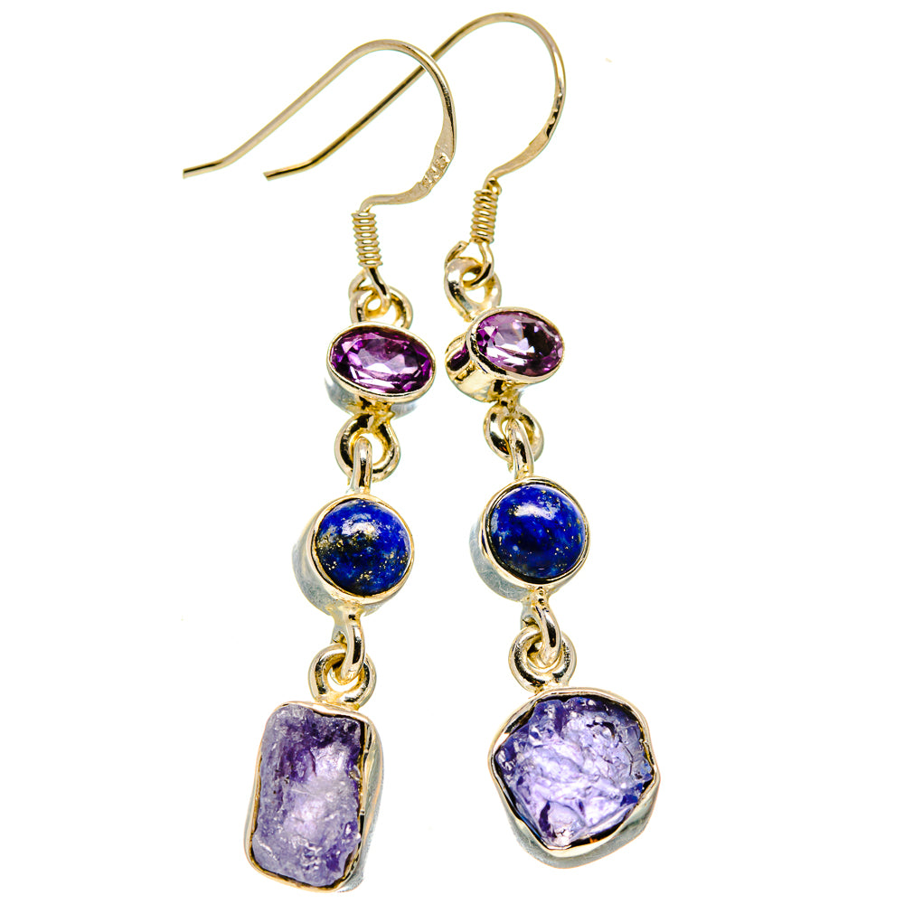Gold-tone dangle earrings with purple oval, blue round, and purple rough stones