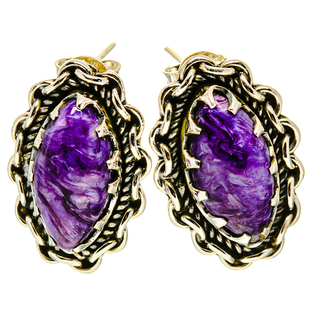 Purple oval cabochon earrings in braided silver-tone metal frames