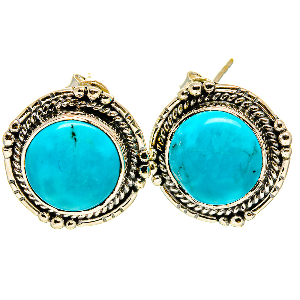 Turquoise cabochon stud earrings in ornate 925 sterling silver oval settings