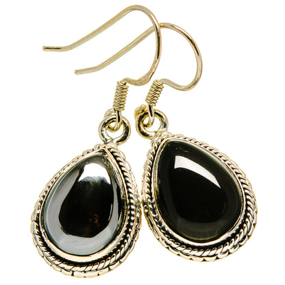 Teardrop black onyx drop earrings with braided silver bezel and fishhook backs