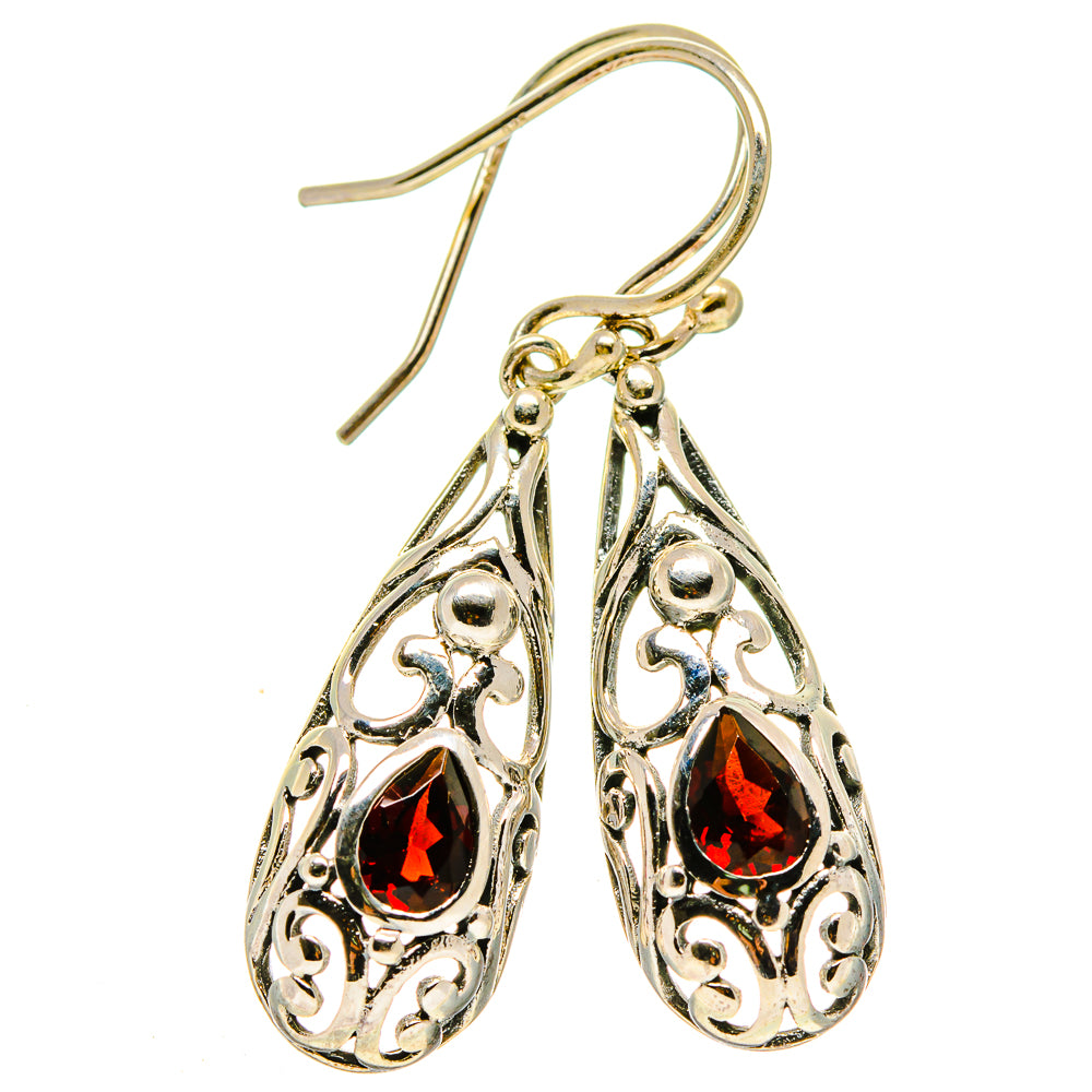 Pair of teardrop filigree earrings with red garnet stones, fishhook style