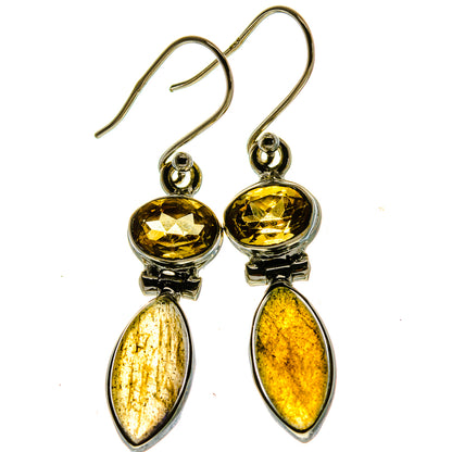 Sterling silver drop earrings with yellow round stones and gold teardrop stones