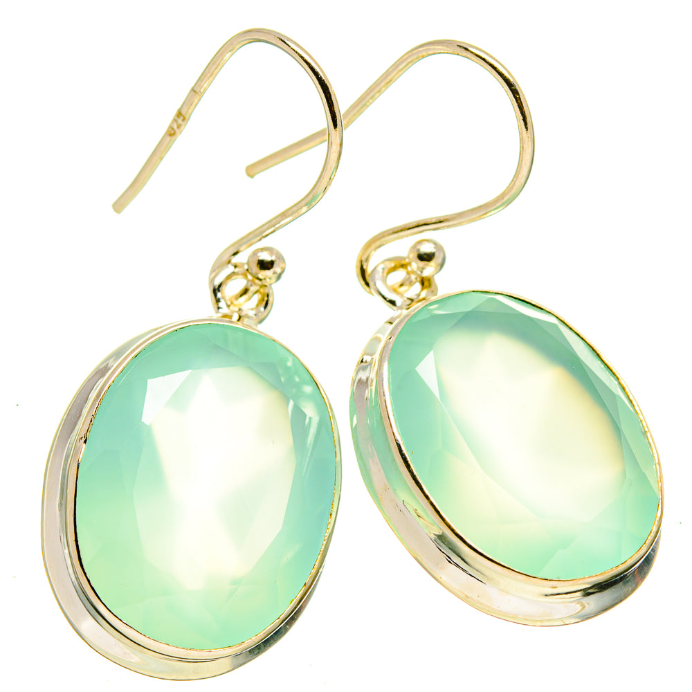 Aqua green oval drop earrings with gold-tone ear wires and scalloped bezel frames