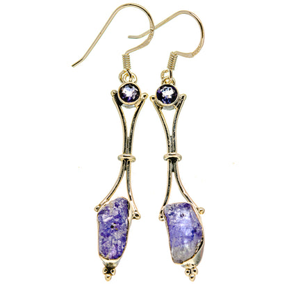 Rough tanzanite drop earrings with oval purple stones and fishhook closures