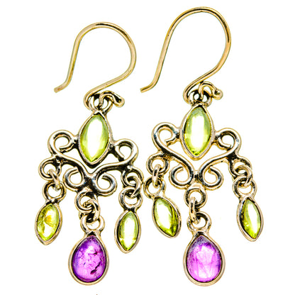 Long drop earrings with peridot green ovals and amethyst purple teardrops, ornate chains