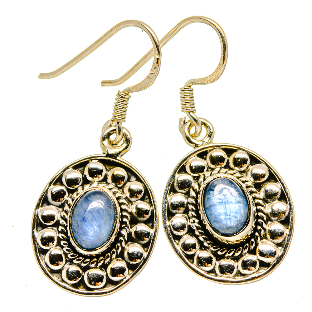 Kyanite drop earrings, oval blue stone in ornate gold-tone round settings with hooks