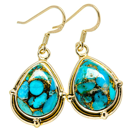 Turquoise oval cabochon drop earrings, gold-tone bezel, sterling silver lever hooks, pair view.