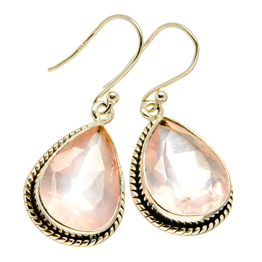 Sterling silver teardrop earrings with pink rose quartz stones, ornate bezel settings
