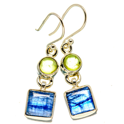 Sterling silver dangle earrings with green peridot-style round stones and blue square kyanite drops