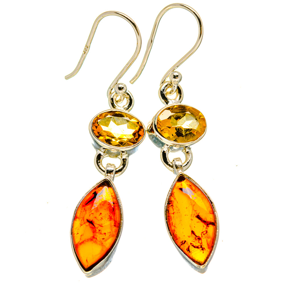 Sterling silver dangle earrings with round yellow tops and amber teardrop drops