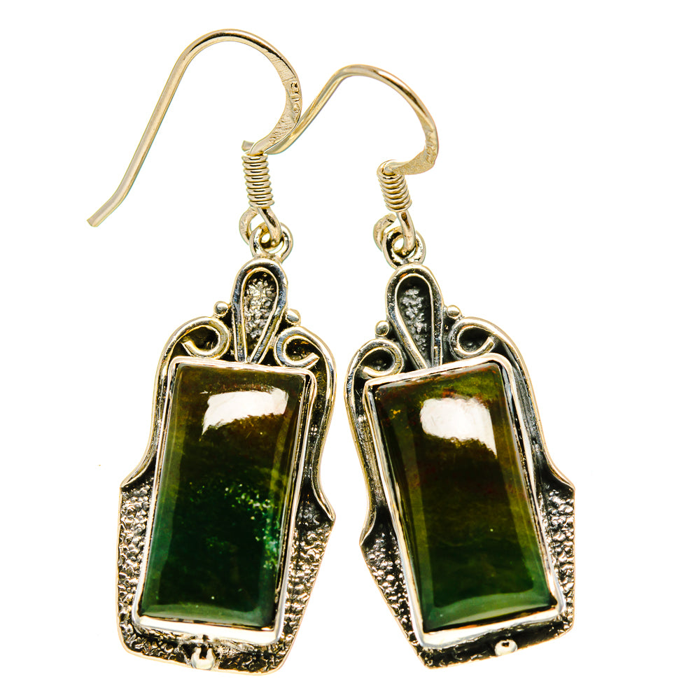 Sterling silver dangle earrings with dark green rectangular stones and ornate frames