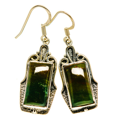 Sterling silver dangle earrings with dark green rectangular stones and ornate frames