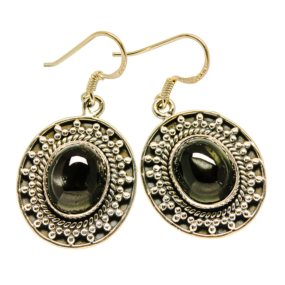 Sterling silver drop earrings with dark green oval diopside and beaded bezel