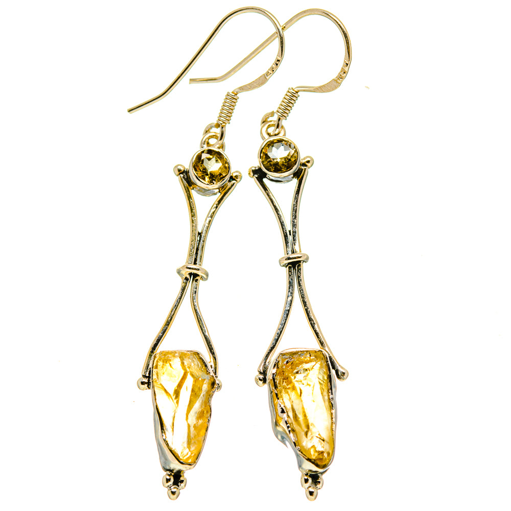 Sterling silver citrine teardrop earrings with rough yellow stones and fishhook backs