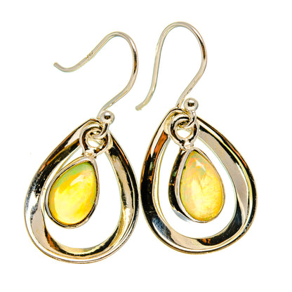 Sterling silver teardrop opal earrings with hook backs