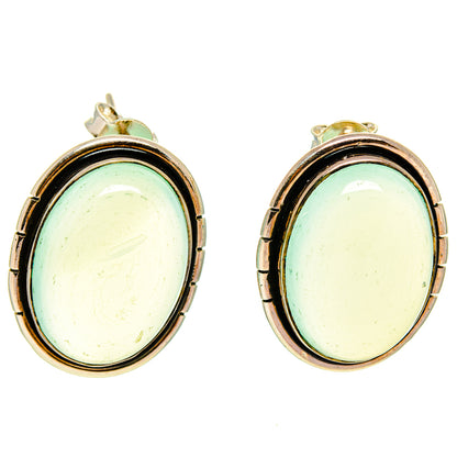 Oval aqua chalcedony stud earrings with gold-tone posts and silver bezel