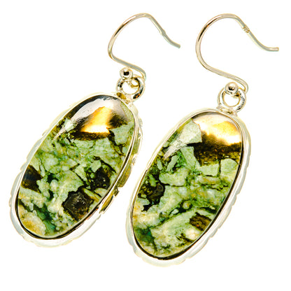 Rainforest opal earrings, two oval green cabochons with silver-tone frames and hooks