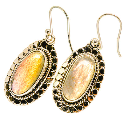 Pair of oval labradorite earrings, sterling silver-tone oval bezel with textured border