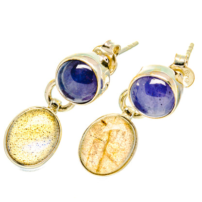 Sterling silver stud-style earrings with blue tanzanite and gold-speckled oval labradorite