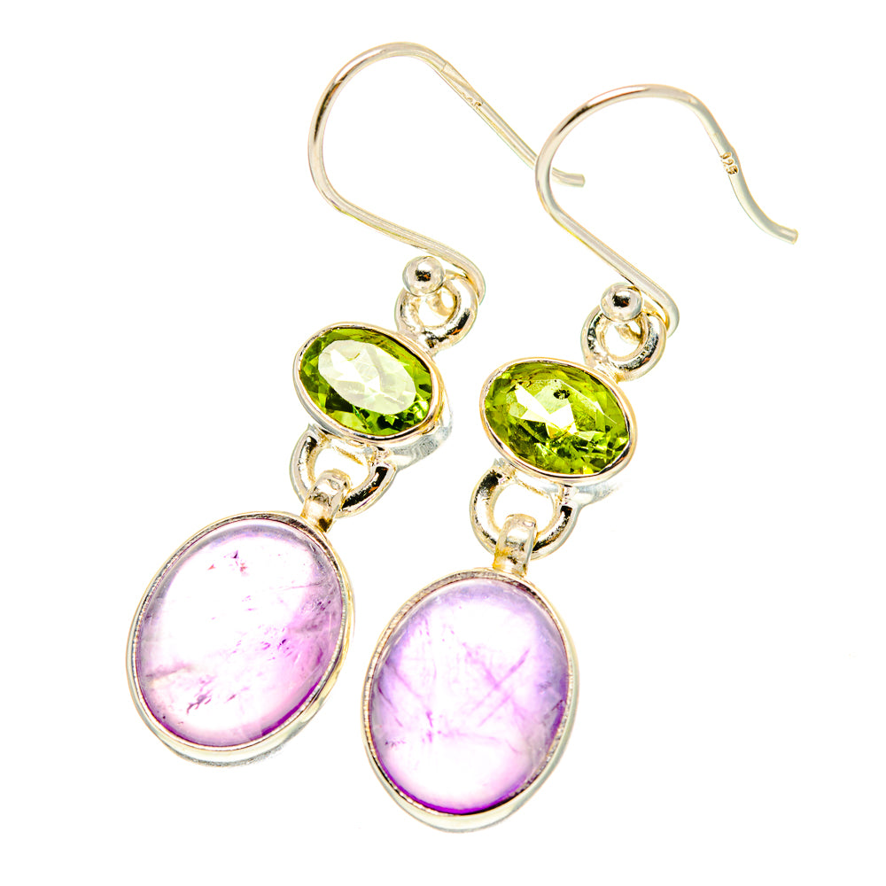 Sterling silver dangling earrings featuring green and purple oval gemstone drops
