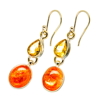 Gold-tone drop earrings with yellow teardrop and orange round gemstones, lever hooks.