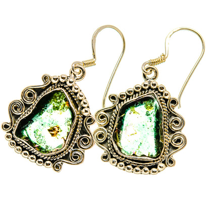 Sterling silver teardrop earrings with bright rough green tourmaline and scroll filigree border