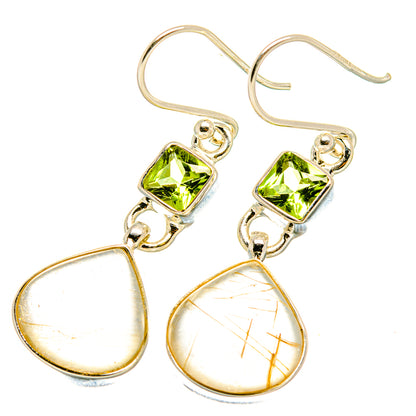 Dangle earrings with green square stones and pear-shaped clear stones, hinged hooks